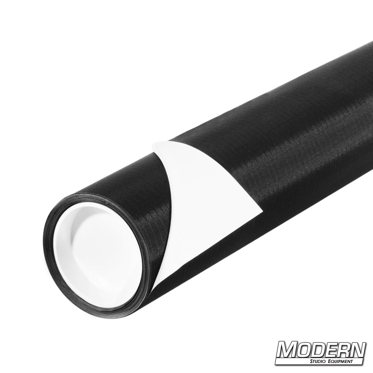 Rolls of Ultrabounce fabric with white and black surfaces, designed for lighting control in photography and film