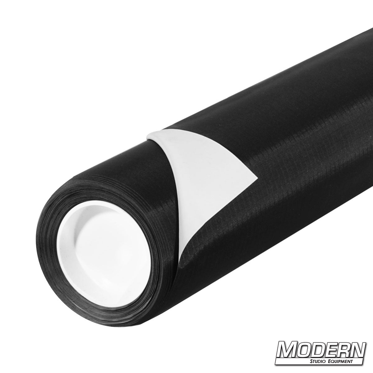 Rolls of Ultrabounce fabric with white and black surfaces, designed for lighting control in photography and film